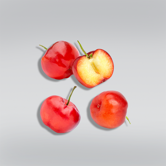 Close-up of fresh Acerola fruits, showcasing their bright red color and juicy texture.