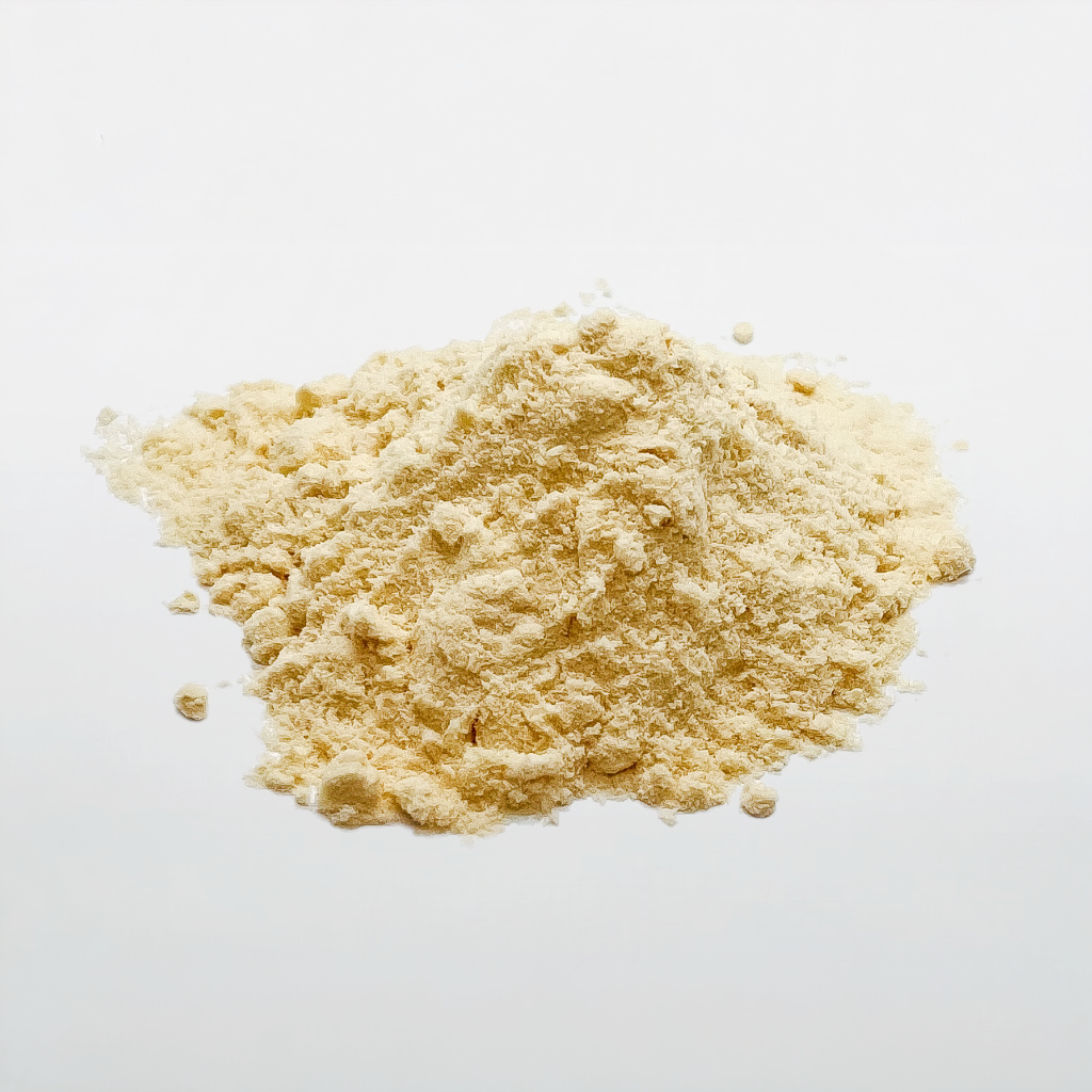 Finely ground Guarana powder, highlighting its light brown color and smooth texture.