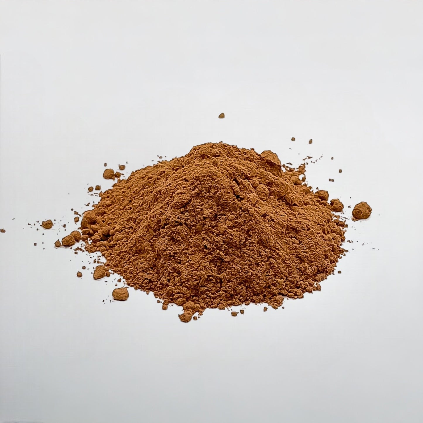 fine Peruvian cacao powder, highlighting its rich brown color and smooth texture, perfect for baking, beverages, and other culinary applications.