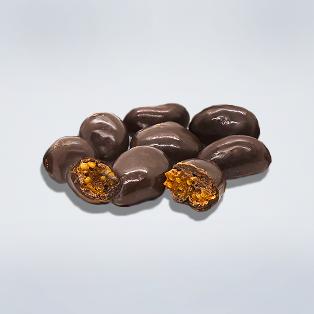 Organic chocolate-coated golden berries, highlighting the glossy chocolate coating and the rich texture of the berries inside.