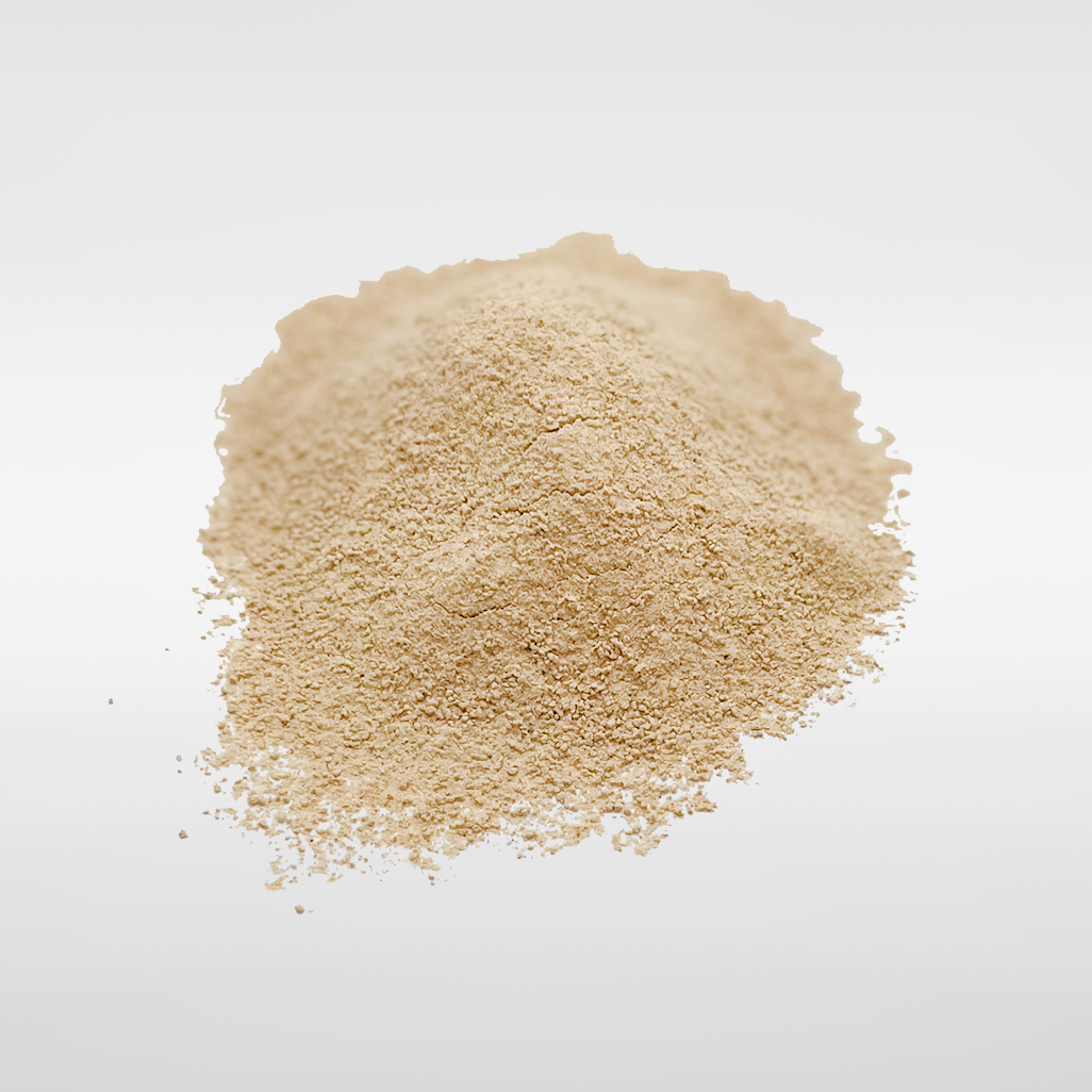 Finely ground Red Maca powder, highlighting its pale, smooth texture.